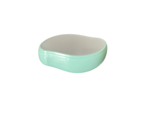 Krystal Hårfjerner Premium Grøn har en ergonomisk form med en lysegrøn yderside og en glat, lys overflade.