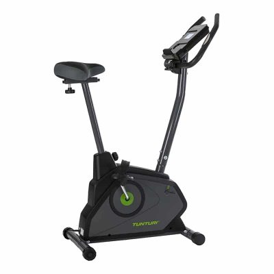 TUNTURI motionscykel med justerbart sæde, digitalt display og stabil ramme. Designet er sort og grønt.